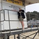 The barefoot sub with her breasts out at the lifeguard station (3)
