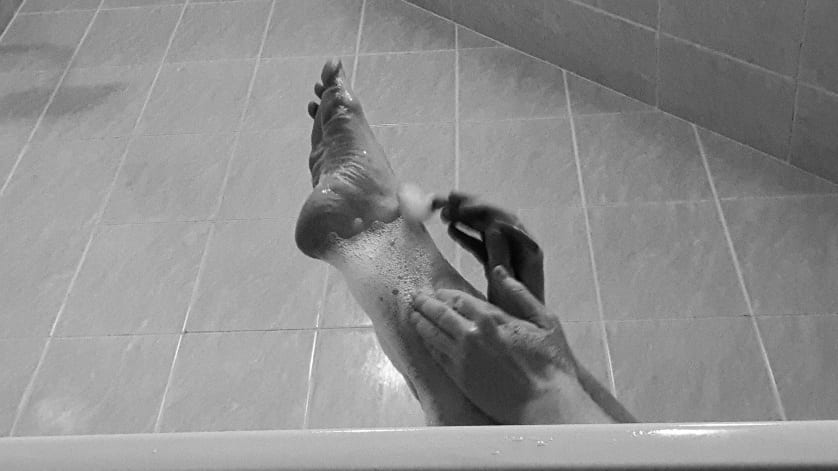 the barefoot subs leg gets a close shave, in black and white