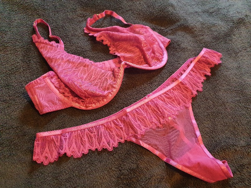 Pink Bra and knickers set being reviewed for two truths and a lingerie lie