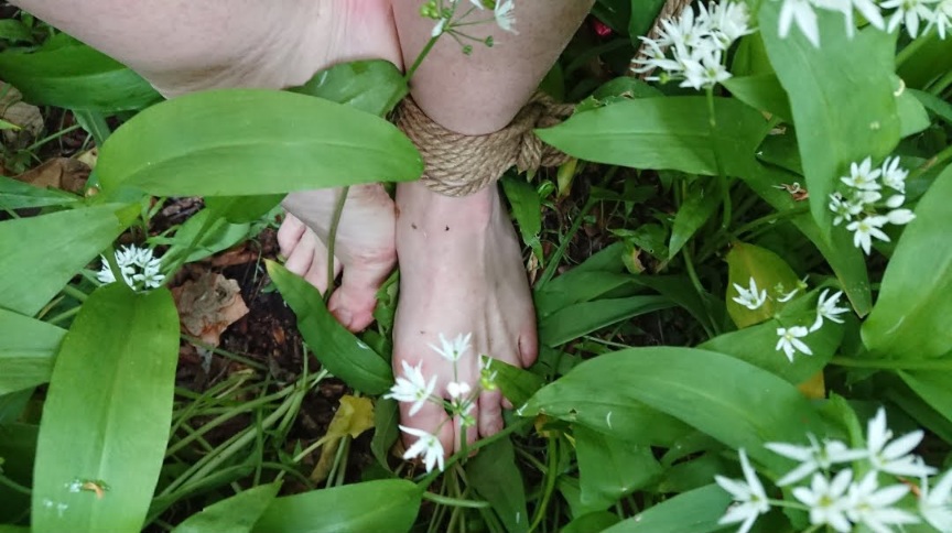 Barefoot and not quite naked in nature.