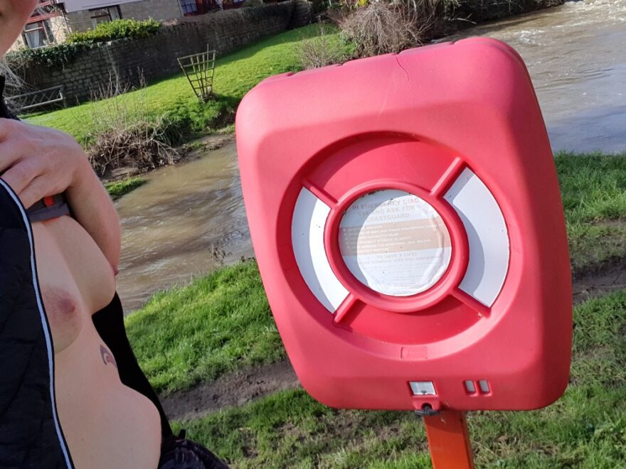 breasts exposed at the flood water for the post throw out a life ring.