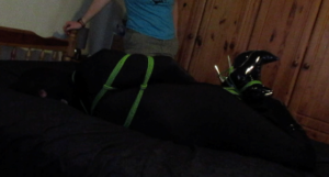 Alice secured in tight bondage thanks to riggers rights.