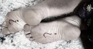 Knowledge is power header image of two bare feet with question marks drawn on them