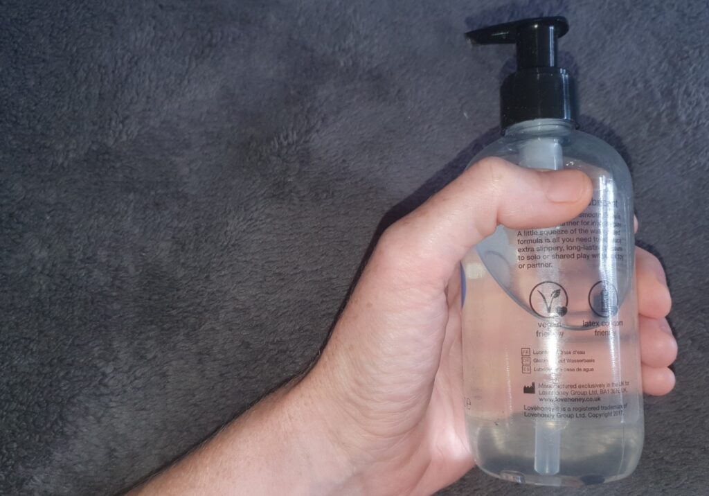 Uncover new passions by trying new things header image shows my hand holding a bottle of lubricant.
