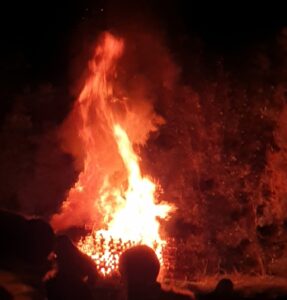Stages of anger header image shows a blazing bonfire on a dark night.