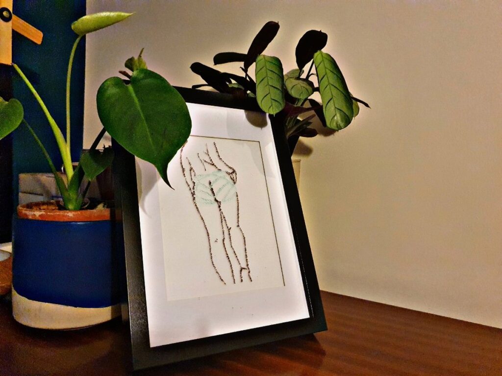 Fused glass art image of my bound booty and legs, created from a photo. With black lines, and green rope lines.