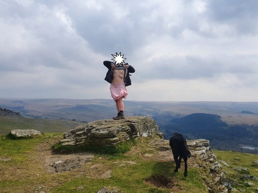Haven to Mail header image shows me exposing my breasts atop Peek Hill tor, with views over Burrator and Leather tor.