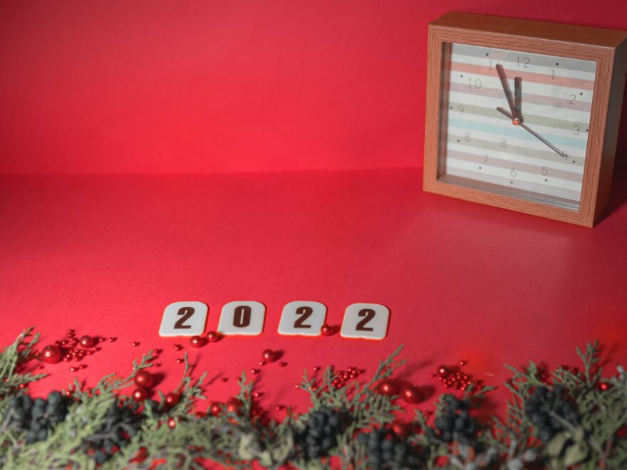 2022 list of top ten posts header shows brown wooden framed analog wall clock