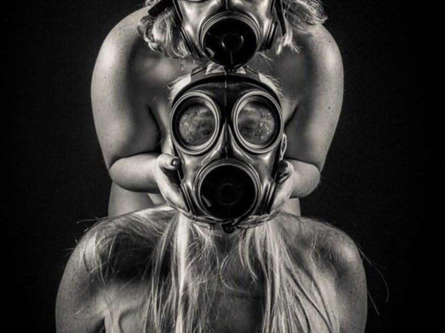 Wearing a gas masks with Dr Lovelace in a dark lion photo
