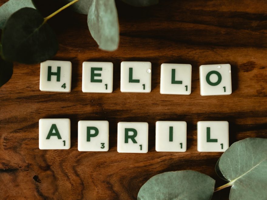Agonising over April header image shows scrabble tiles saying "hello April" laid out on a wooden table