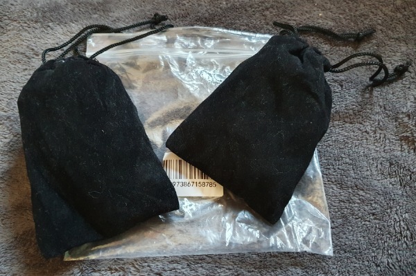 The plugs came in velvet bags, in a plastic zip lock bag. 