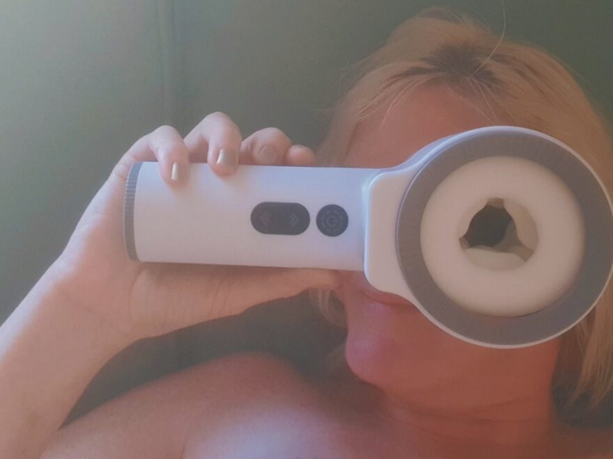 Playing peek a boo through the dual ended blow job masturbator from Bestvibe.