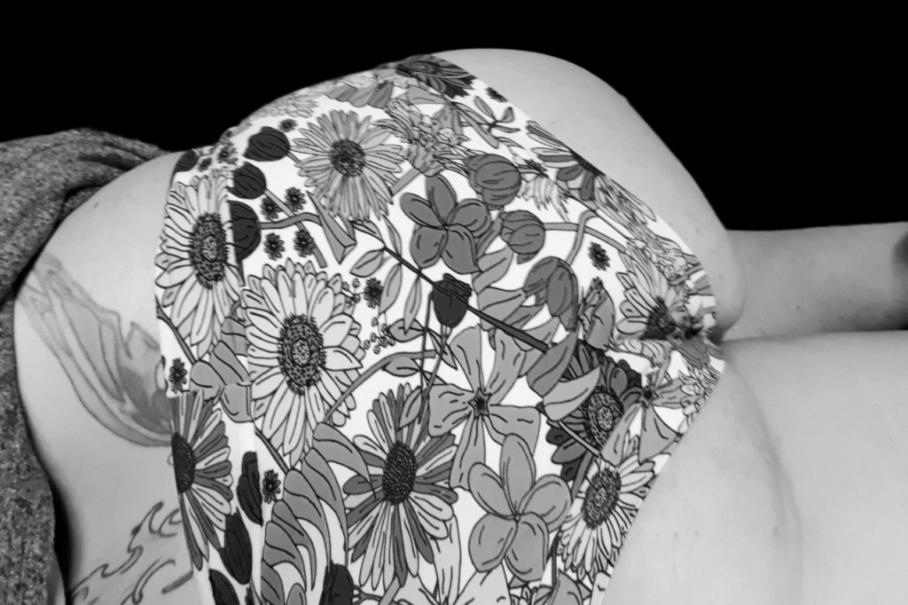 super booty floral knickers, this time in black and white, as I lay on the bed.