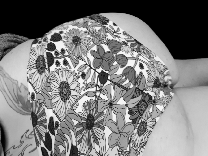 super booty floral knickers, this time in black and white, as I lay on the bed.