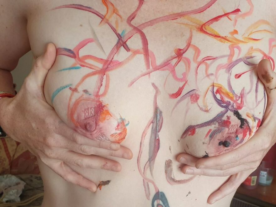 My naked breasts were decorated with creatively artistic fireworks and meanly sadistic clamp marks.